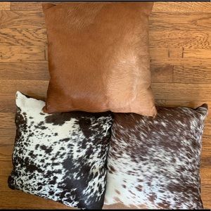 3 natural Animal hide pillows